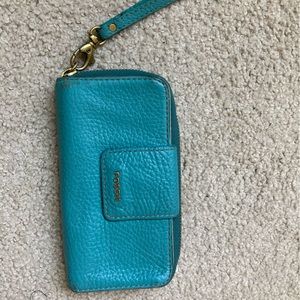 Fossil wallet and cellphone holder.